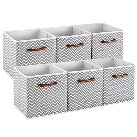 Set of 4 small 11-inch faux leather storage cubes for organizing toys, shoes, closets, and office clutter. . 11 inch storage bins